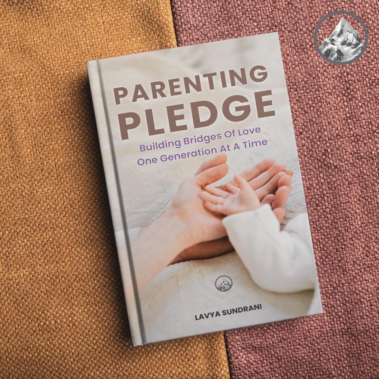 The Parenting Pledge book on fabric — lifestyle shot