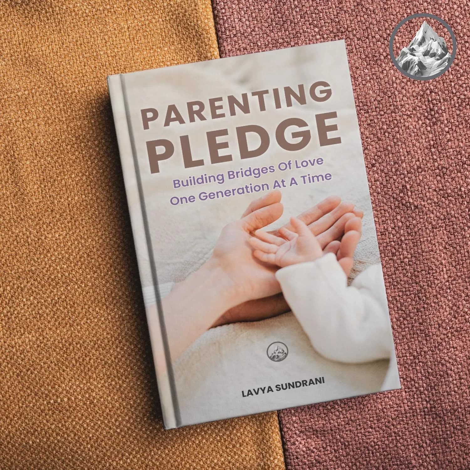 The Parenting Pledge book on fabric — lifestyle shot